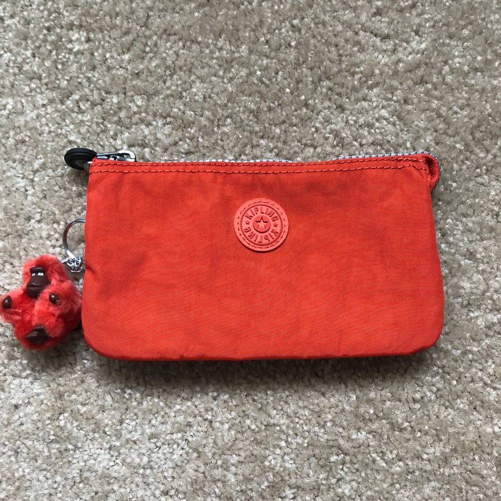 Kipling orange pouch